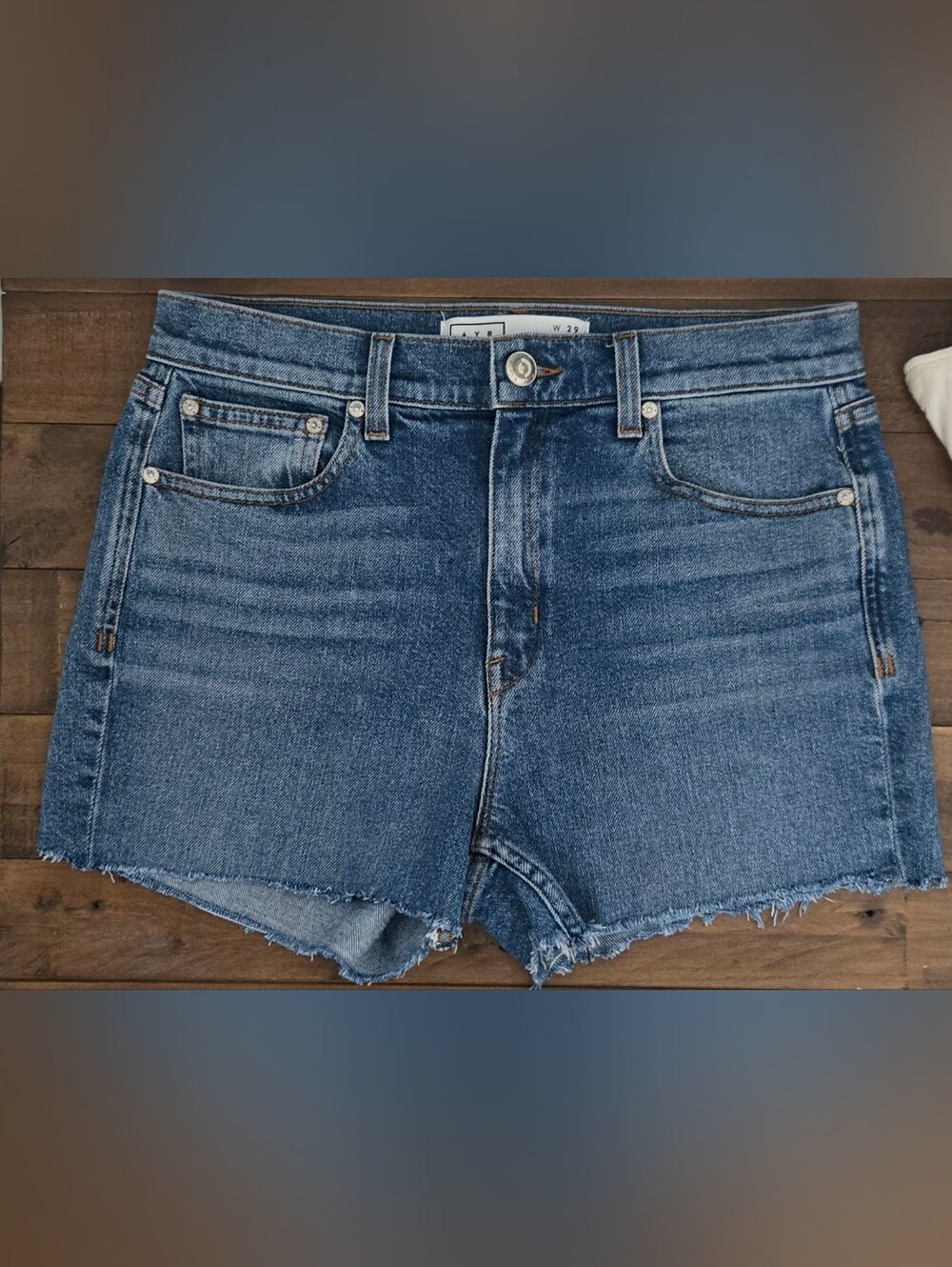 AYR Medium Wash Cutoff Denim Shorts with Raw Hem Retail $145
